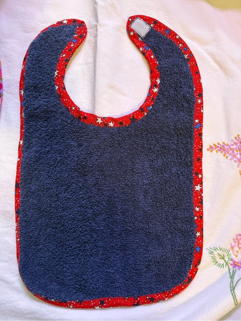 4th of July ! Handmade Navy Blue Baby Bib with Red Star Trim. New
